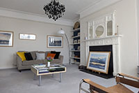 Guest sitting room with original fire surround